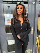 Vestje “Mouwtjes” zwart