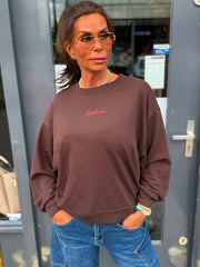 Sweater "Cest la vie" donkerbruin / oranje