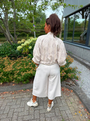 Suedine jasje broderie beige