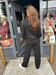 Tweedelig pak “Life” applicatie zwart