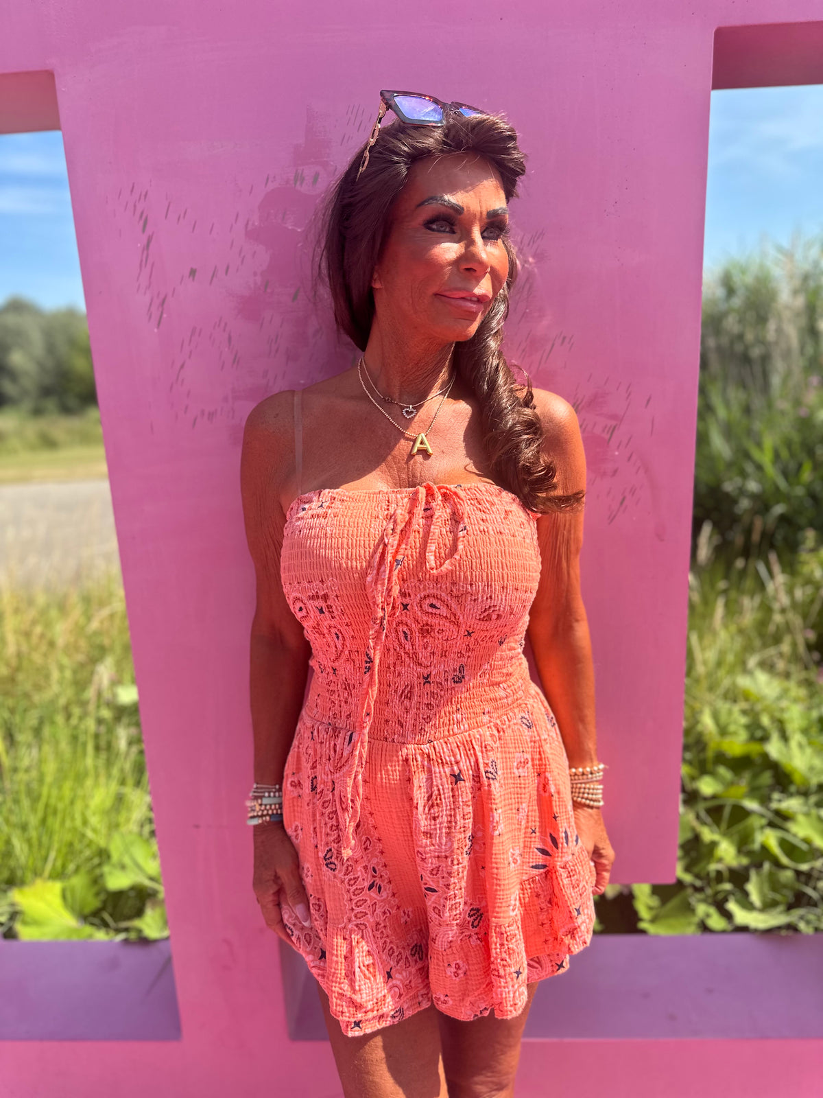 Playsuit kort "hydrofiel" print zalm