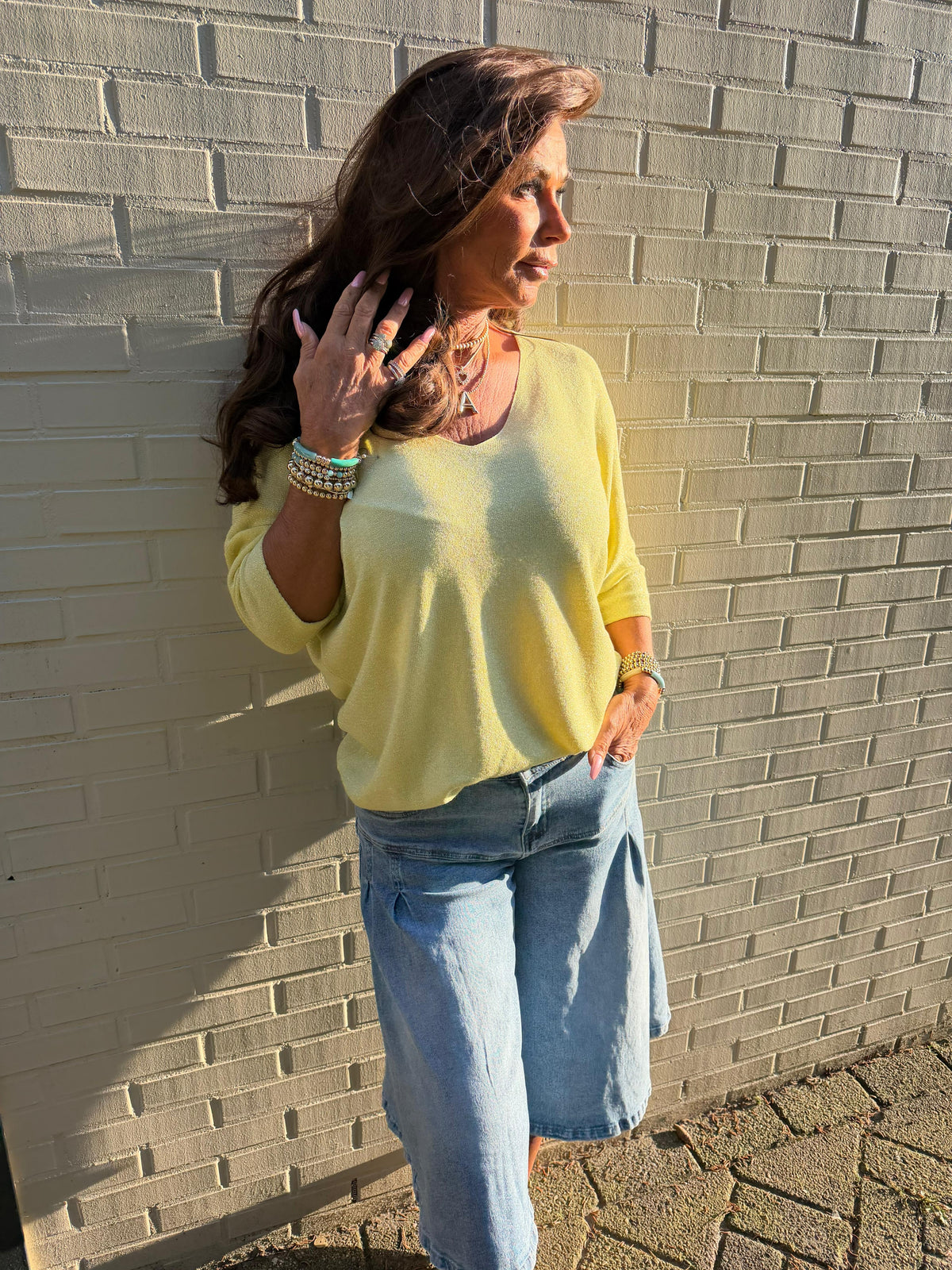 Truitje glitter v-hals geel