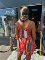 Strapless jumpsuit “Aruba” oranje