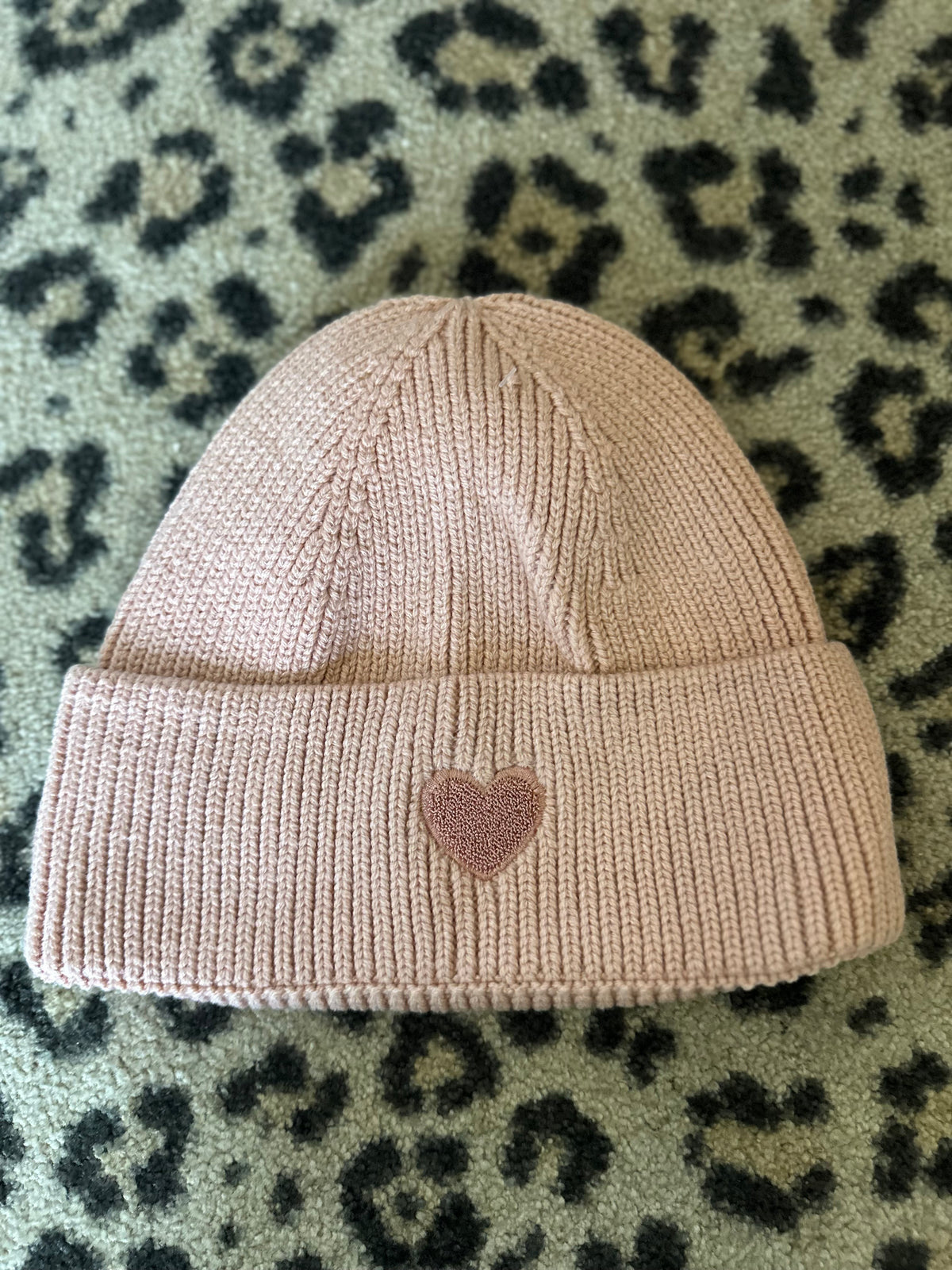 Muts “hart” oud roze